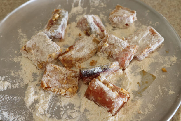 Spanish mackerel coated in flour