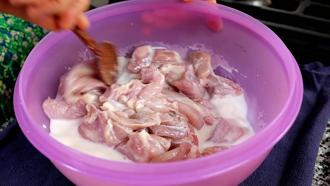 mixing chicken with milk