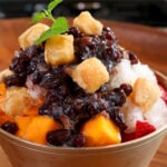 Korean shaved Ice with Sweet Red Beans and Fruits (Patbingsu: 팥빙수)